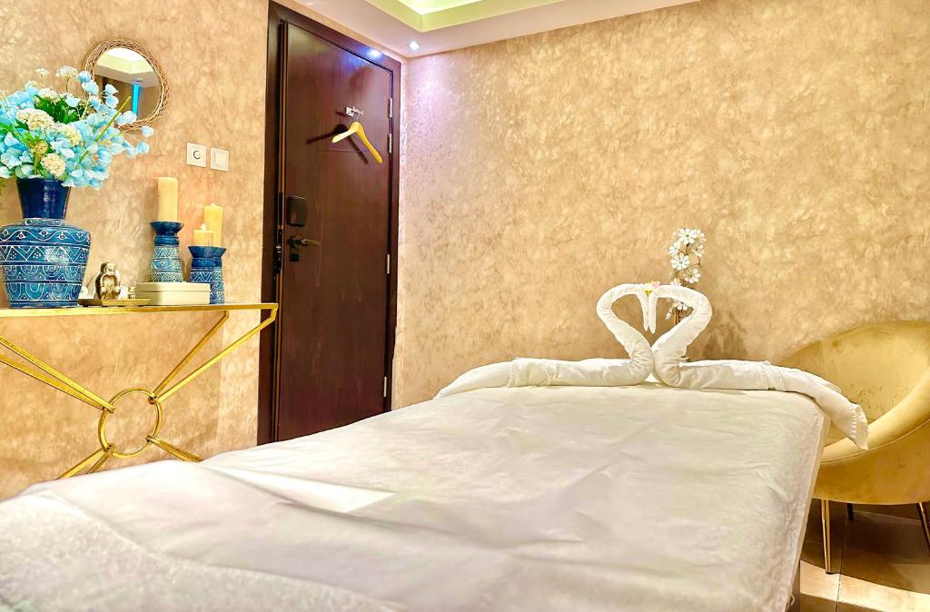 Postel nebo postele na pokoji v ubytování Studio M Al Barsha Hotel by Millennium