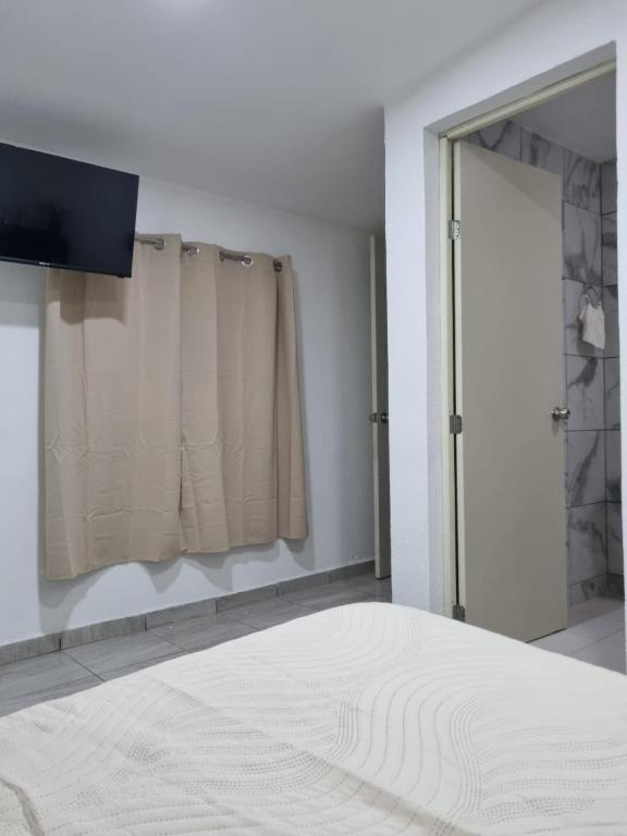 Postel nebo postele na pokoji v ubytování Villas La Vista