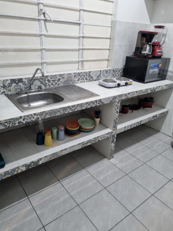 Kuchyň nebo kuchyňský kout v ubytování Villas La Vista