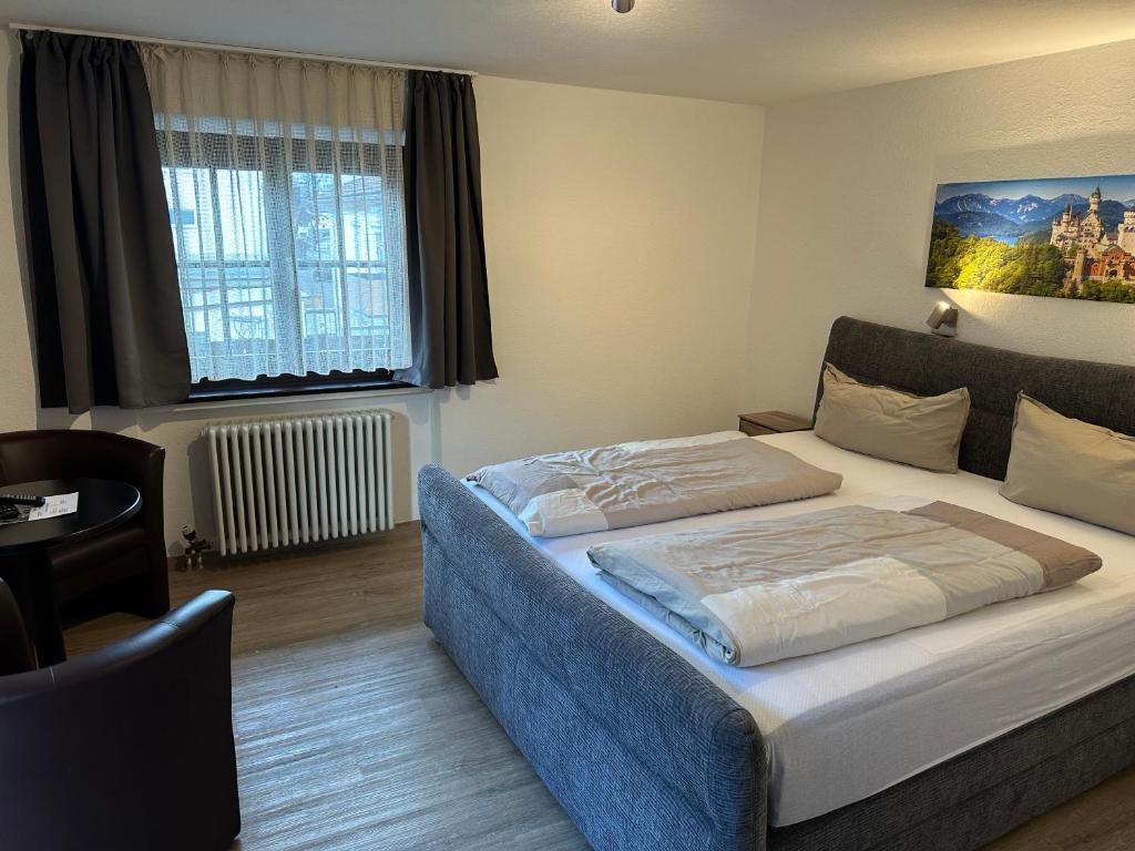 Postel nebo postele na pokoji v ubytování Hotel Fürstenhof