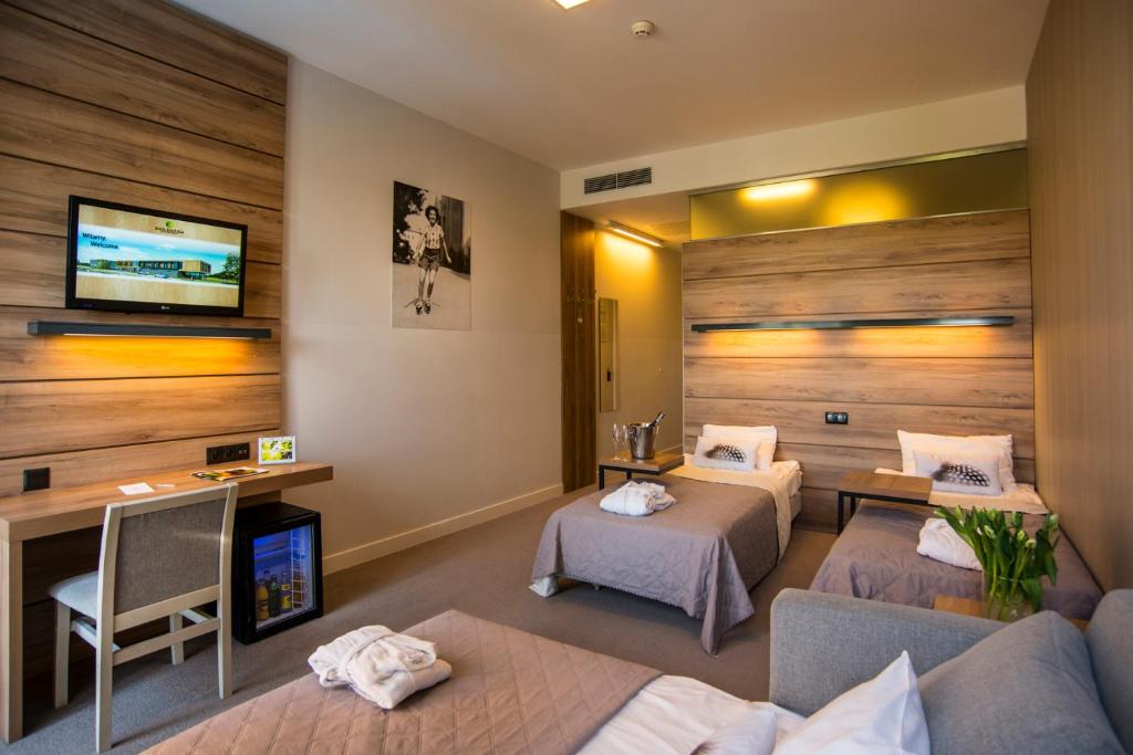 Postel nebo postele na pokoji v ubytování Hotel Bonifacio SPA&SPORT Resort