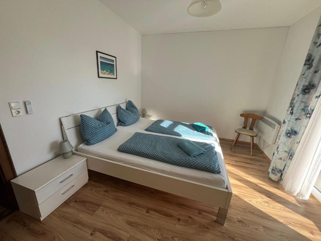 Postel nebo postele na pokoji v ubytování Panorama Apartments Semslach