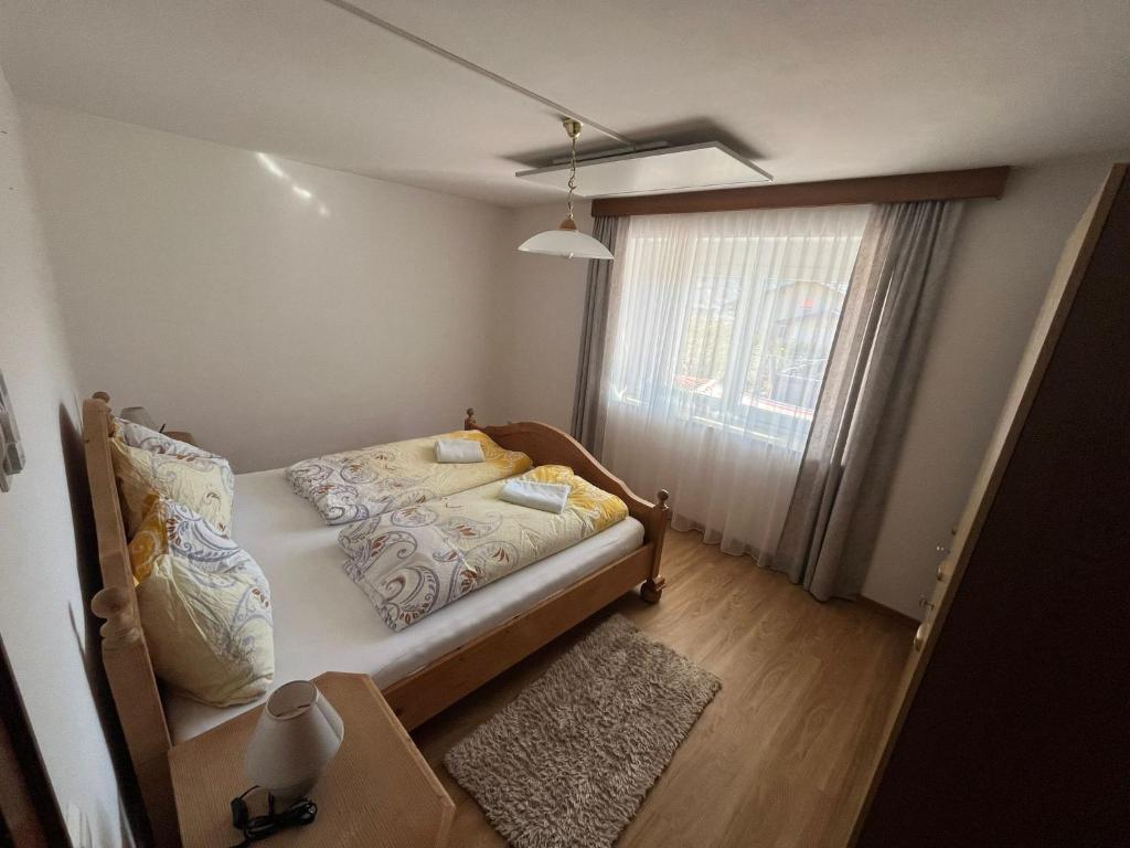 Postel nebo postele na pokoji v ubytování Panorama Apartments Semslach