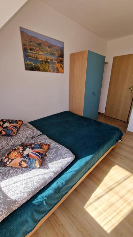 Posteľ alebo postele v izbe v ubytovaní Gościniec Solanka