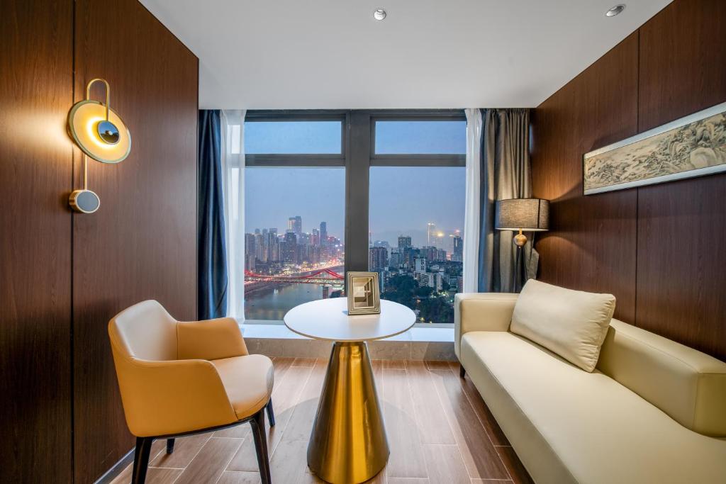 Posezení v ubytování Chongqing Junsheng Yunduan Riverview Hotel