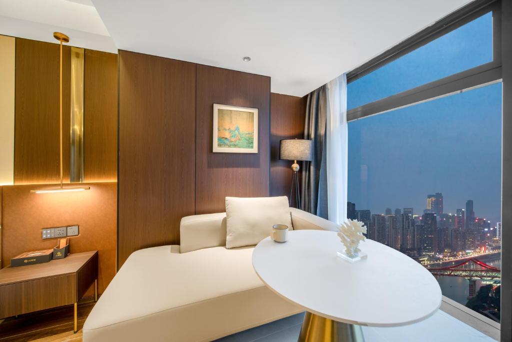 Posezení v ubytování Chongqing Junsheng Yunduan Riverview Hotel