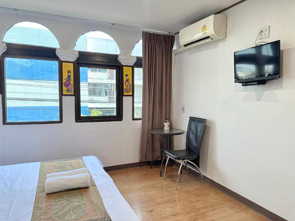 TV a/nebo společenská místnost v ubytování Longzhu Guesthouse