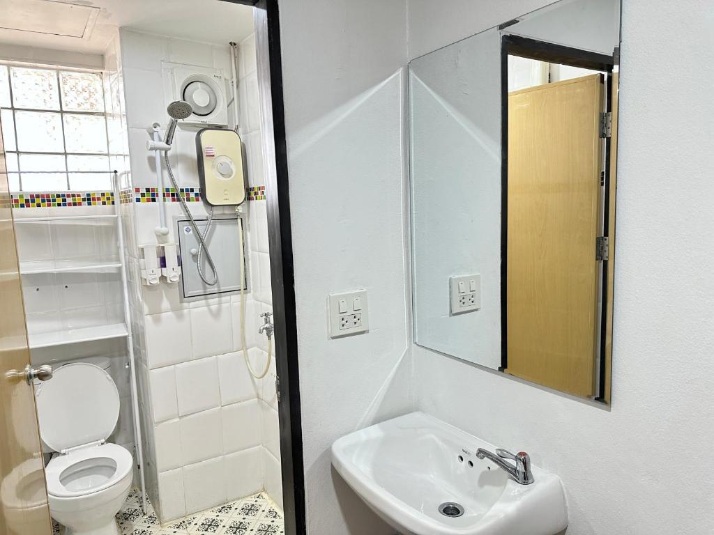 Koupelna v ubytování Longzhu Guesthouse