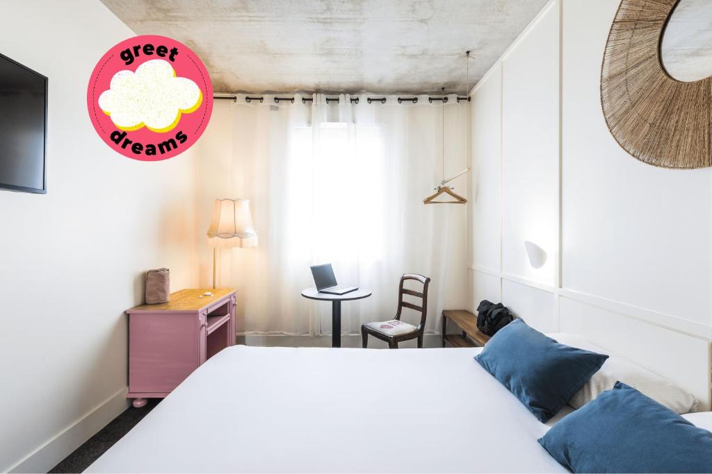 Postel nebo postele na pokoji v ubytování Greet Hotel Limoges Nord