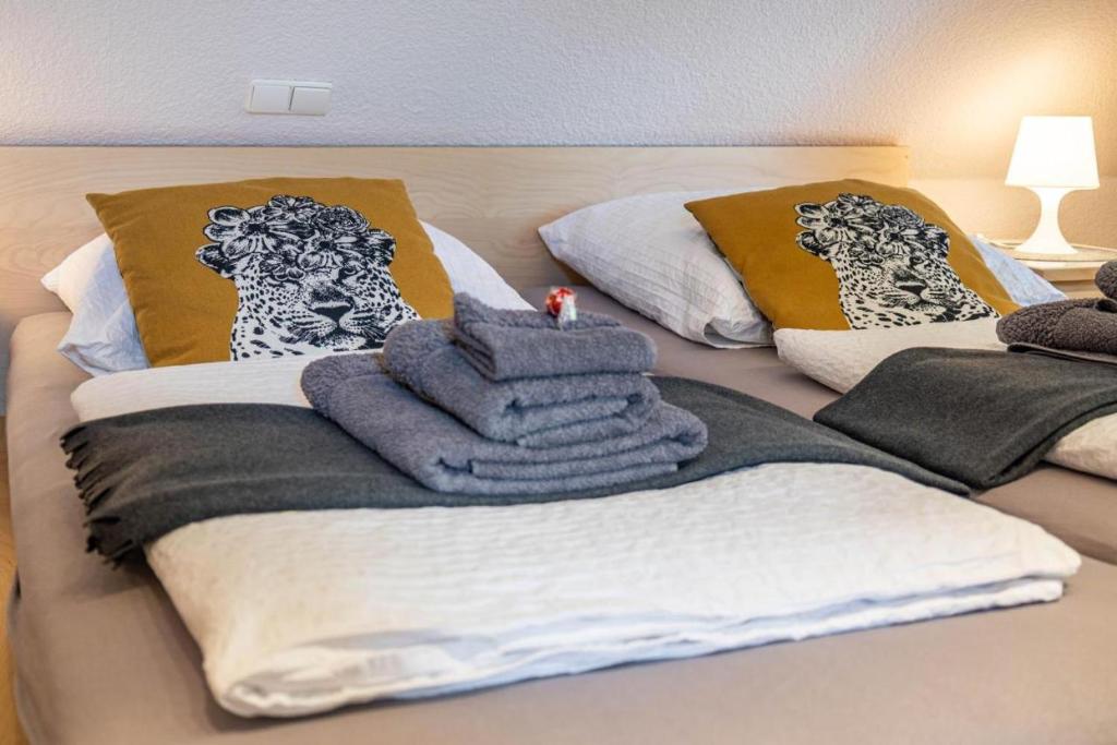Postel nebo postele na pokoji v ubytování Lindensweet