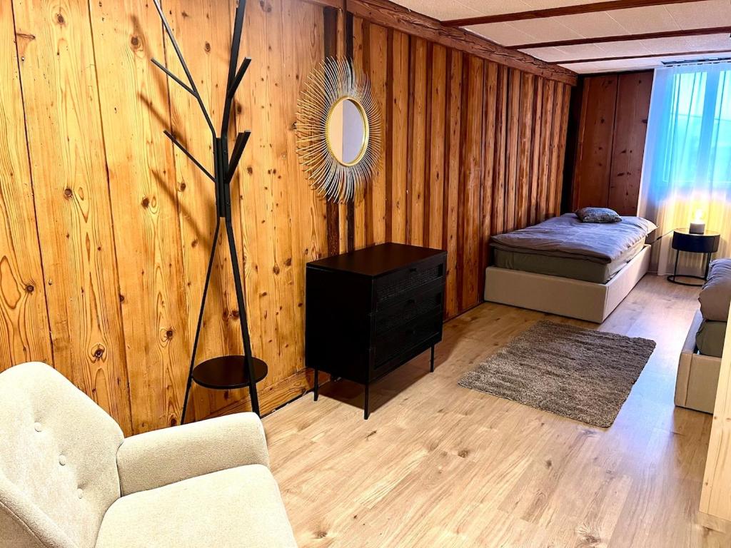 Postel nebo postele na pokoji v ubytování Maison Verdeau Ferien am Murtensee