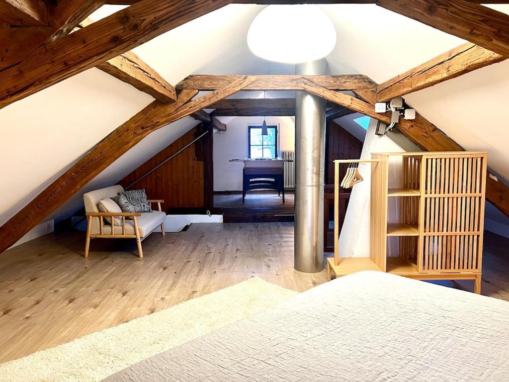 Postel nebo postele na pokoji v ubytování Maison Verdeau Ferien am Murtensee