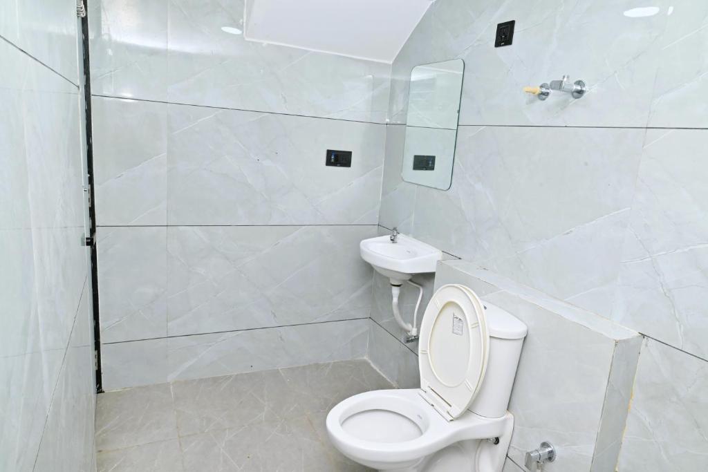 Koupelna v ubytování Hotel RV Residency