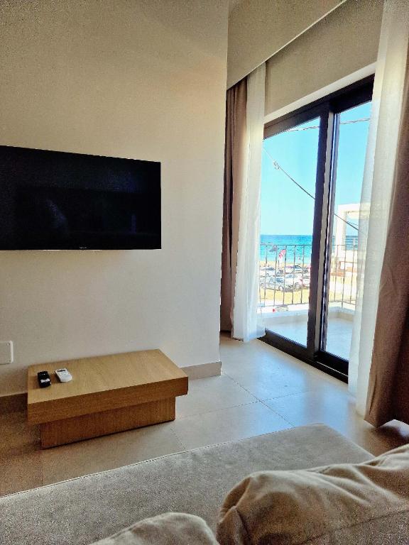 TV a/nebo společenská místnost v ubytování NAMI Seaside