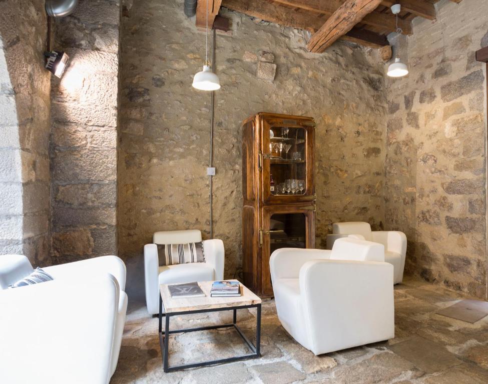 Posezení v ubytování AS Palau dels Alemanys Suites Boutique Monument