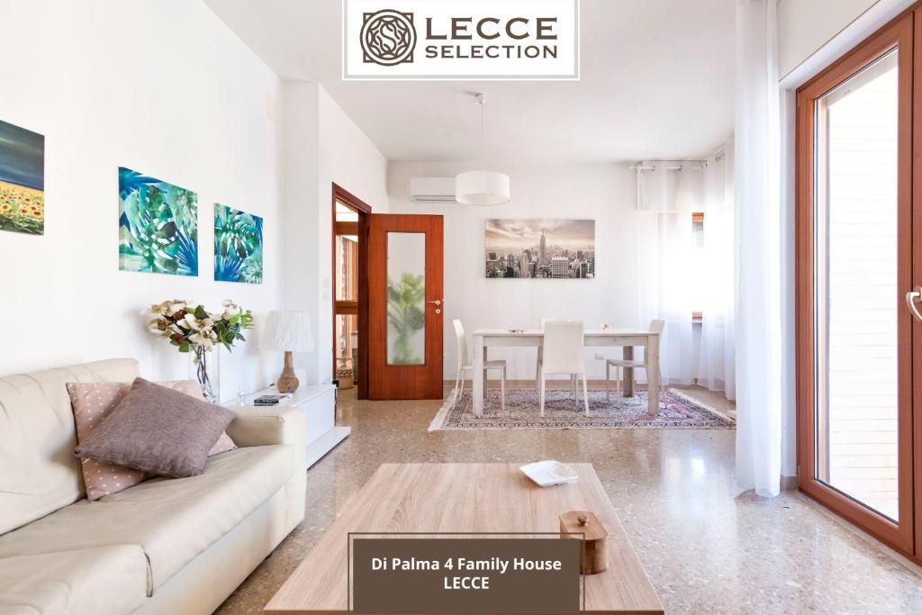 a living room with a couch and a table at Di Palma 4 Family House - Lecce Selection in Lecce
