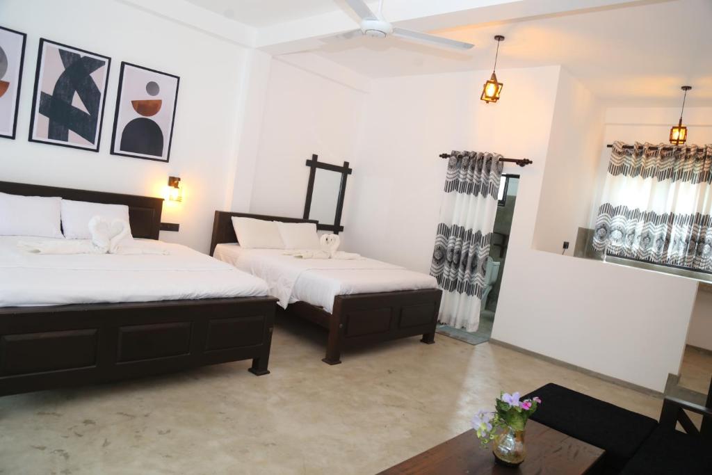 Postel nebo postele na pokoji v ubytování Go Yala Hostel