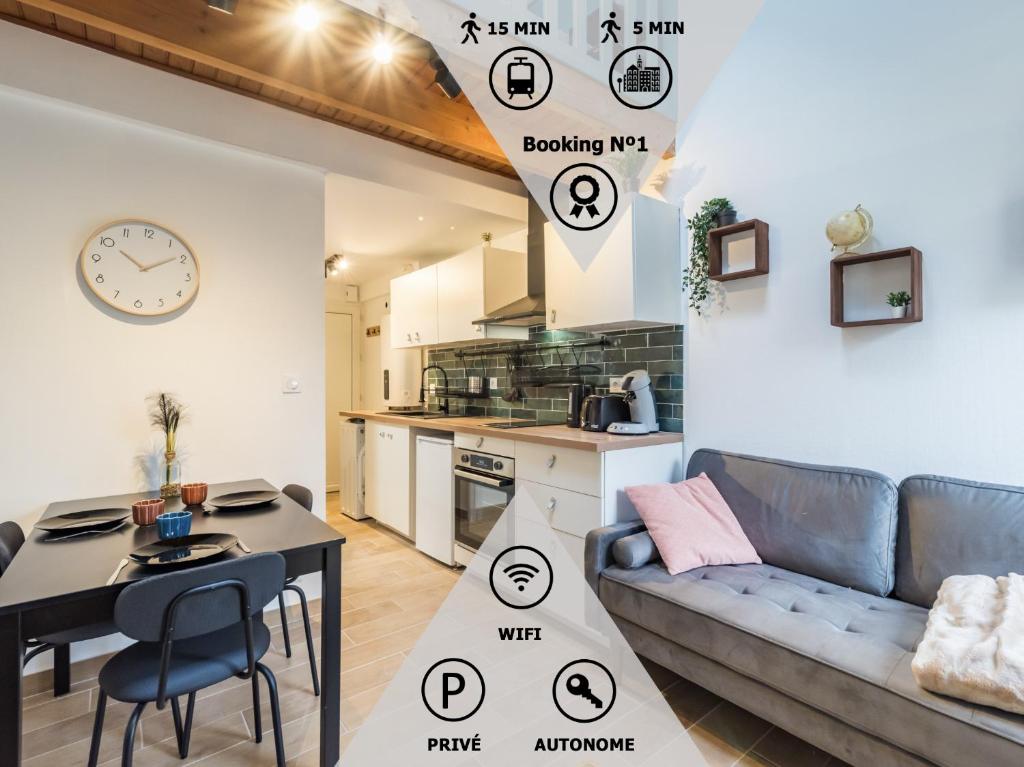 a living room with a couch and a table at NEW Le Turquoise au coeur de Guingamp Parking in Guingamp