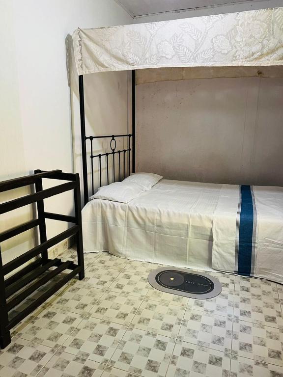 Postel nebo postele na pokoji v ubytování Meeyan Ella Rest