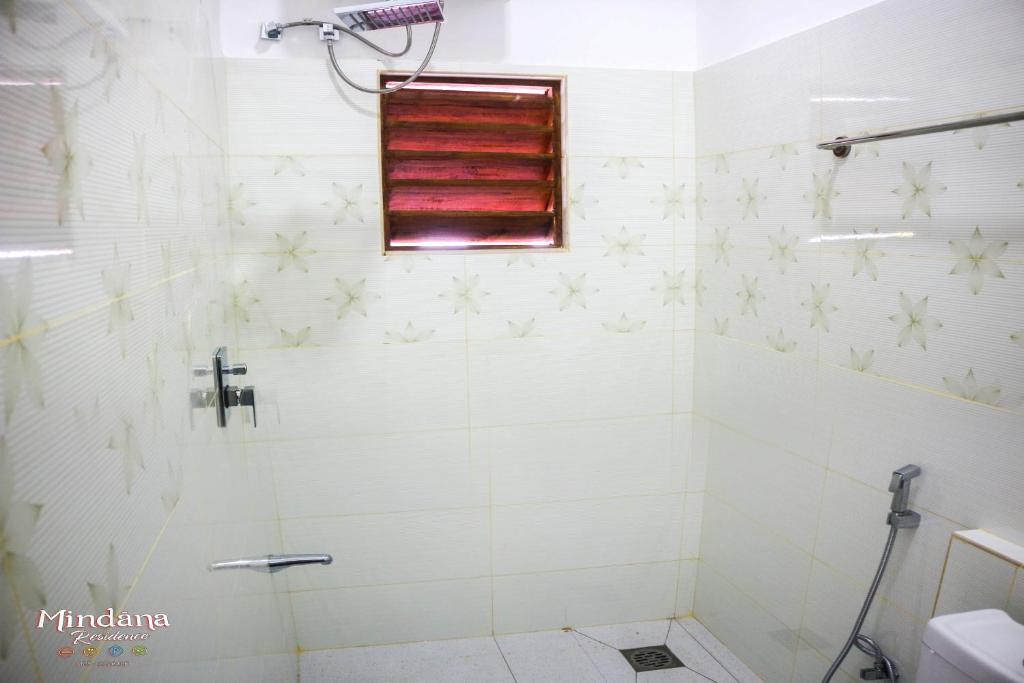 Koupelna v ubytování Mindana Residence