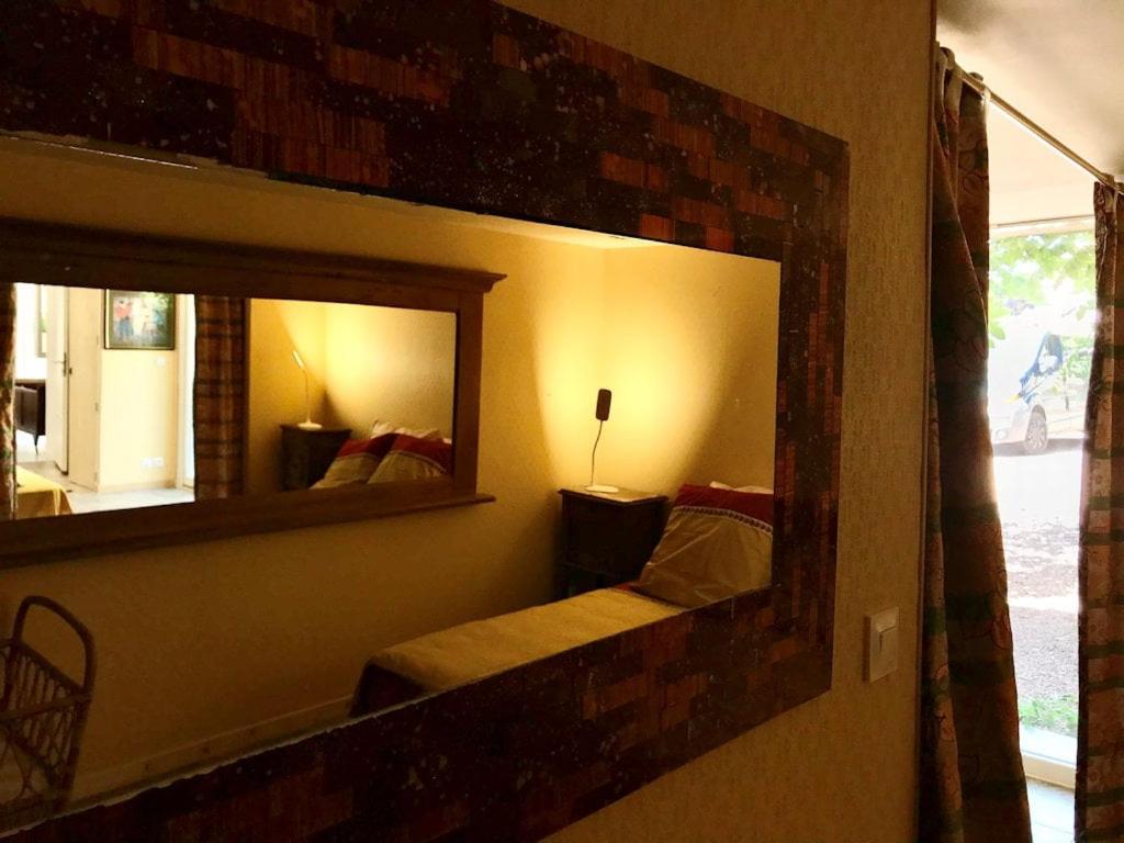 Postel nebo postele na pokoji v ubytování Chambre Swingy - Gîte les Zazous