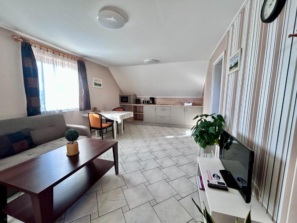Posezení v ubytování Nemes Apartmanház
