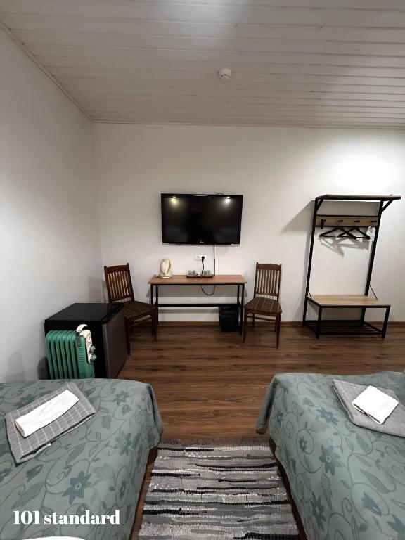 Postel nebo postele na pokoji v ubytování Guesthouse Carl Schmidt