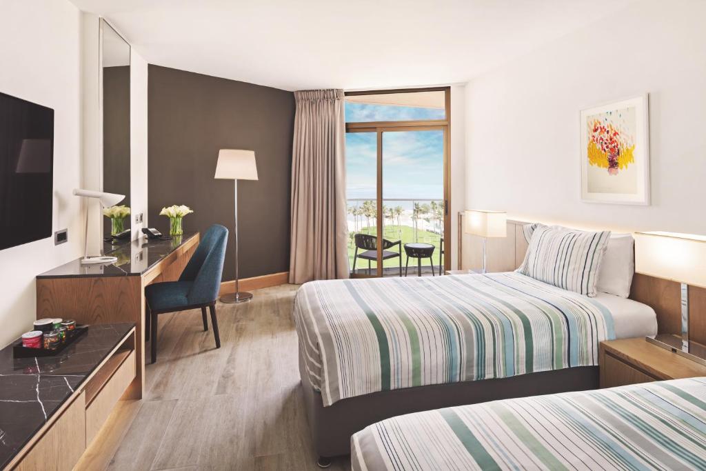 JA The Resort - JA Beach Hotel, Dubai - 