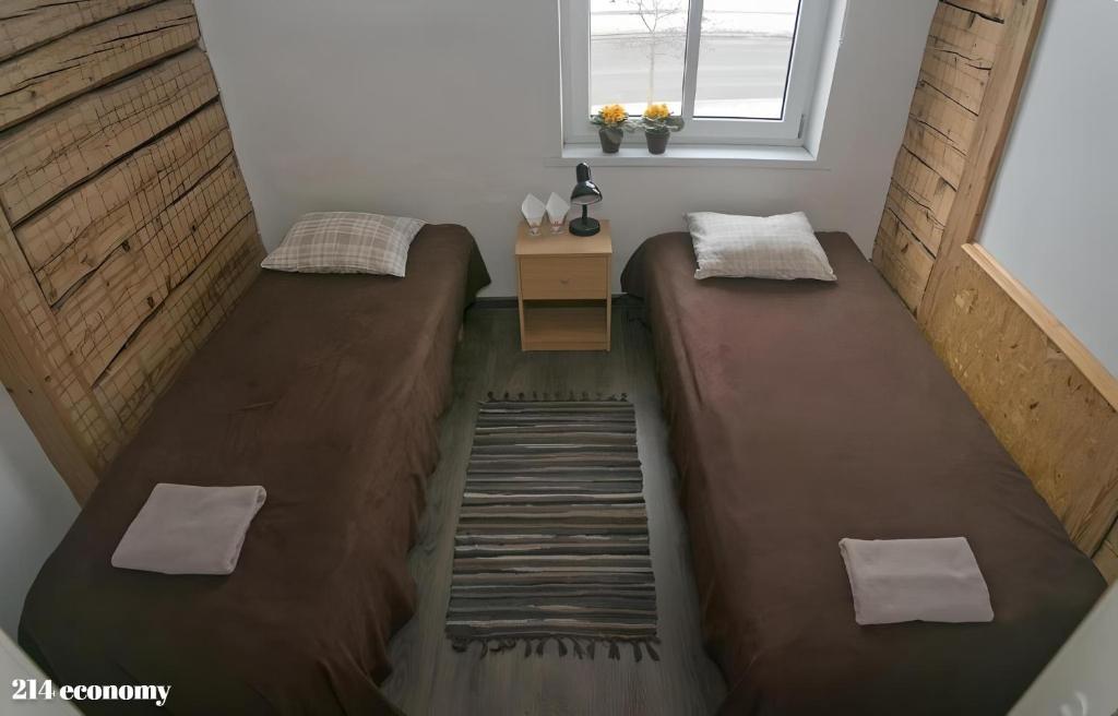 Postel nebo postele na pokoji v ubytování Guesthouse Carl Schmidt