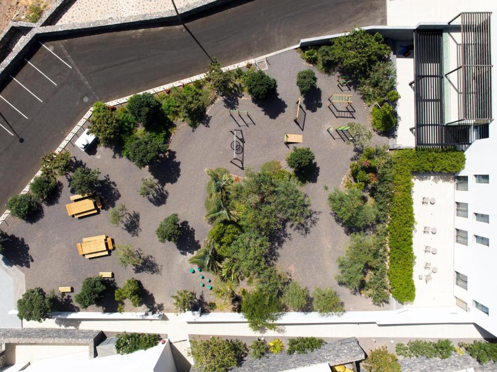 an overhead view of a park with trees and bushes at BANCAL HOTEL and SPA in San Sebastián de la Gomera