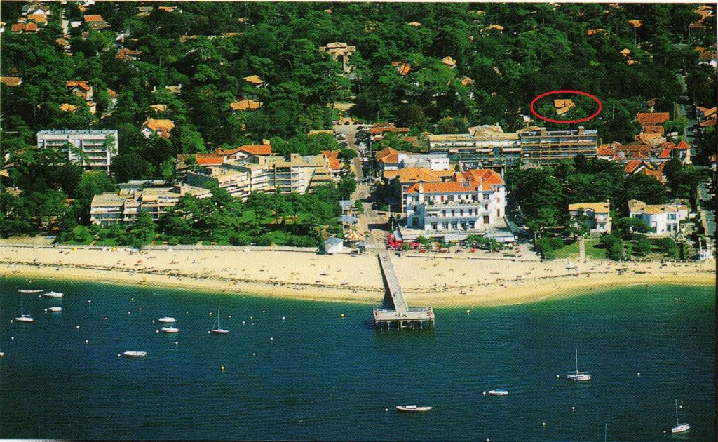 an aerial view of a beach with boats in the water at Villa Surprise in Arcachon