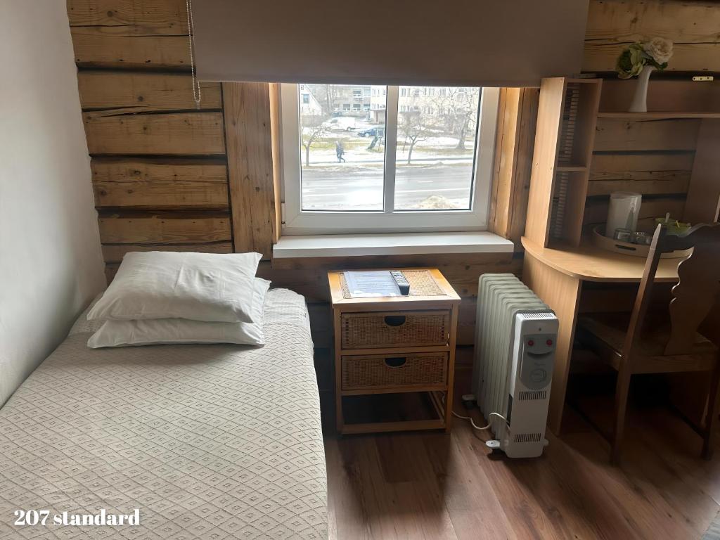 Postel nebo postele na pokoji v ubytování Guesthouse Carl Schmidt