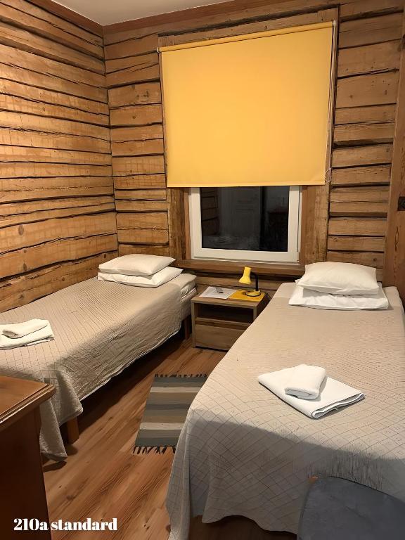 Postel nebo postele na pokoji v ubytování Guesthouse Carl Schmidt