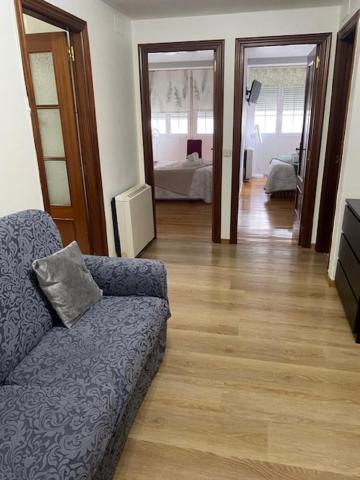 Una cama o camas en una habitación de Apartamento próximo a la catedral