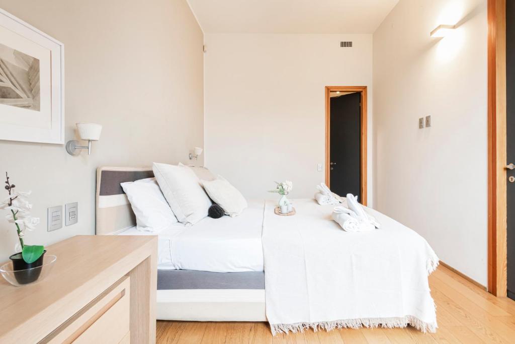 Posteľ alebo postele v izbe v ubytovaní Wonderful Brera flat