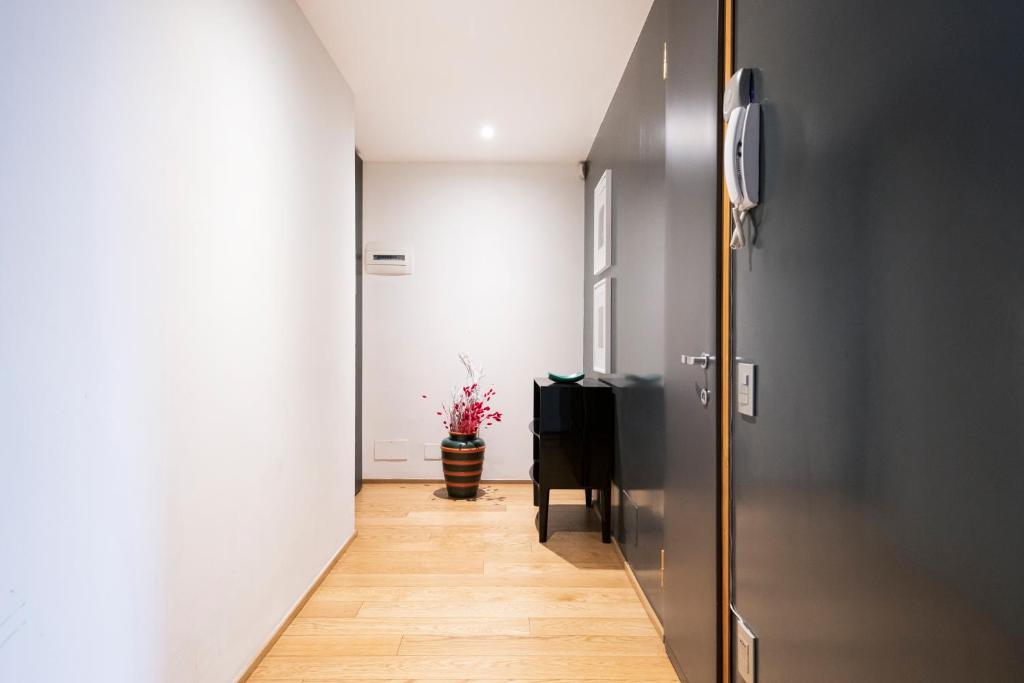 Televízia a/alebo spoločenská miestnosť v ubytovaní Wonderful Brera flat