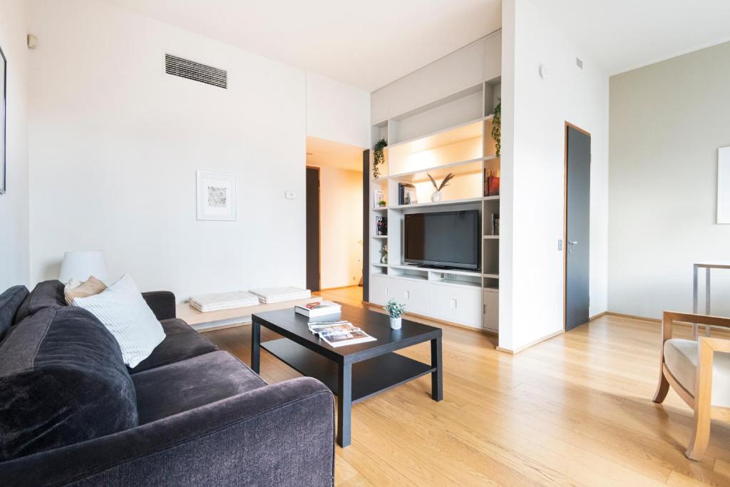 Televízia a/alebo spoločenská miestnosť v ubytovaní Wonderful Brera flat