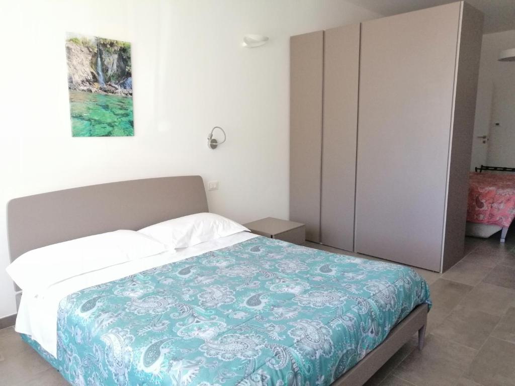 Postel nebo postele na pokoji v ubytování LA RIPA