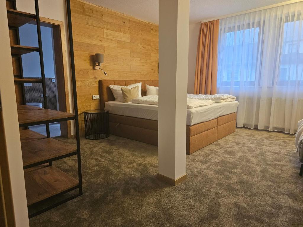 Voodi või voodid majutusasutuse Familien-Hotel Am Tränkbachtal Frauenwald toas