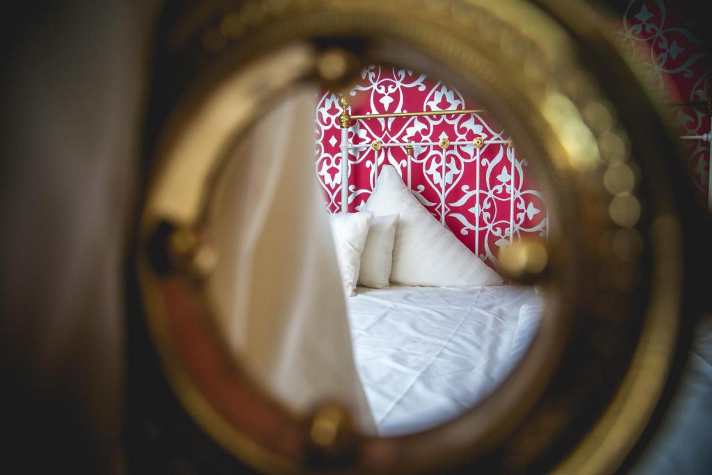 Postel nebo postele na pokoji v ubytování Hotel Alexander