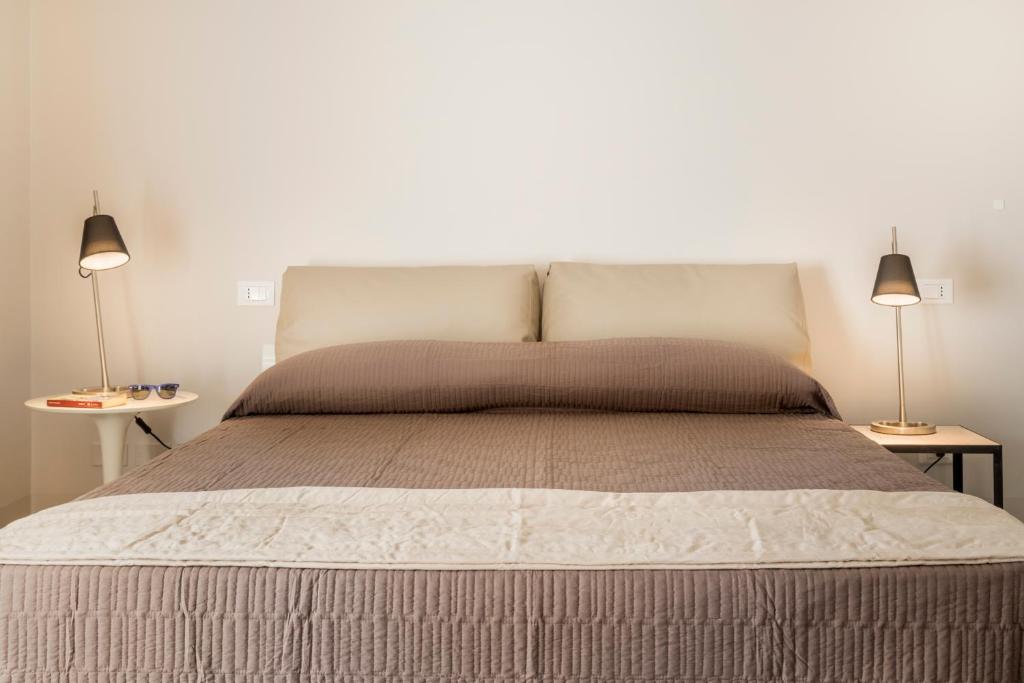 Postel nebo postele na pokoji v ubytování B&B Vicere Speciale