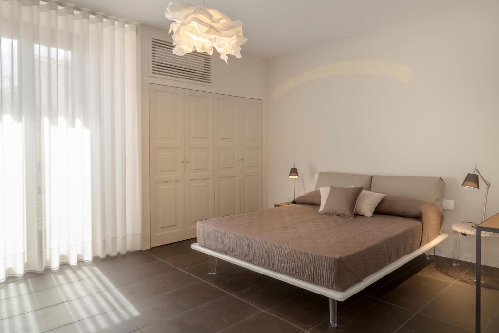 Postel nebo postele na pokoji v ubytování B&B Vicere Speciale
