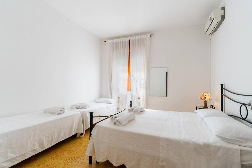 Postel nebo postele na pokoji v ubytování B&B Marchese by Vivimy