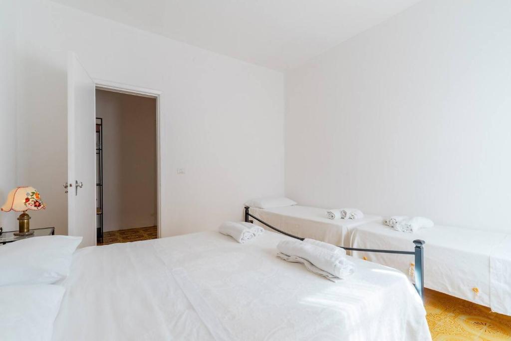 Postel nebo postele na pokoji v ubytování B&B Marchese by Vivimy