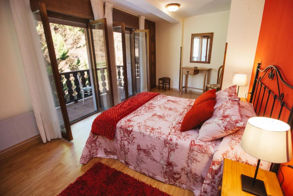 Cama o camas de una habitación en Hotel Rural El Molino