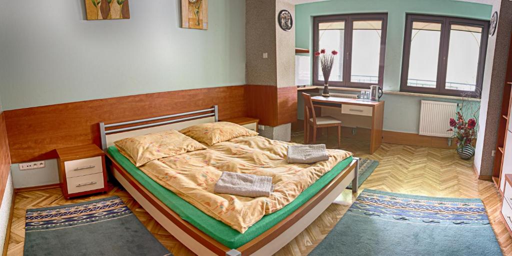 Postel nebo postele na pokoji v ubytování Adeo Hostel