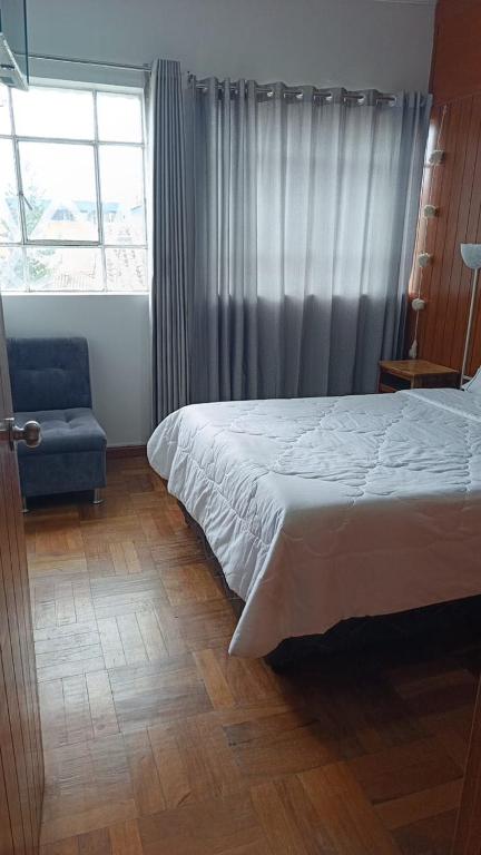 Postel nebo postele na pokoji v ubytování Don Andre House