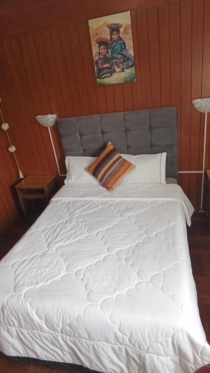 Postel nebo postele na pokoji v ubytování Don Andre House