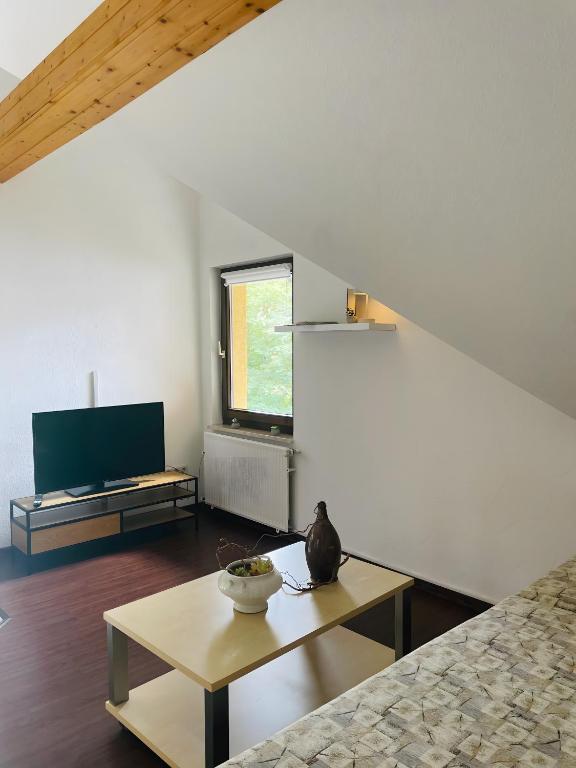Sjónvarps- og/eða afþreyingartæki á Ferienwohnung Gaßmann