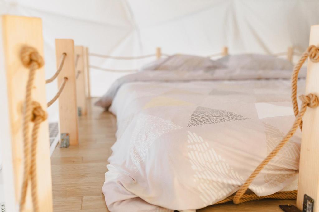 Postel nebo postele na pokoji v ubytování Glamping Drina Riverzone
